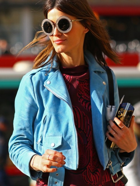 STREET-STYLE-FASHION-WEEK-ROUND-SUNGLASSES-HANNELI-MUSTAPARTA-BLOGGER-EMBELLISHED-OVERSIZED-SUNGLASSES-BLUE-SUEDE-LEATHER-MOTO-JACKET-EMBROIDERED-SWEATER-RINGS-KNUCKLE-RING-CLUTCH-BAG-VOGUE-MAGAZINE