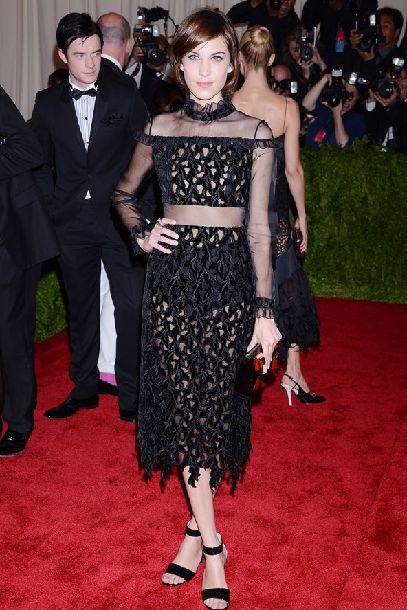 Alexa Chung flew the flag for British fashion in an Erdem autumnwinter 2013 14 black panelled dress.