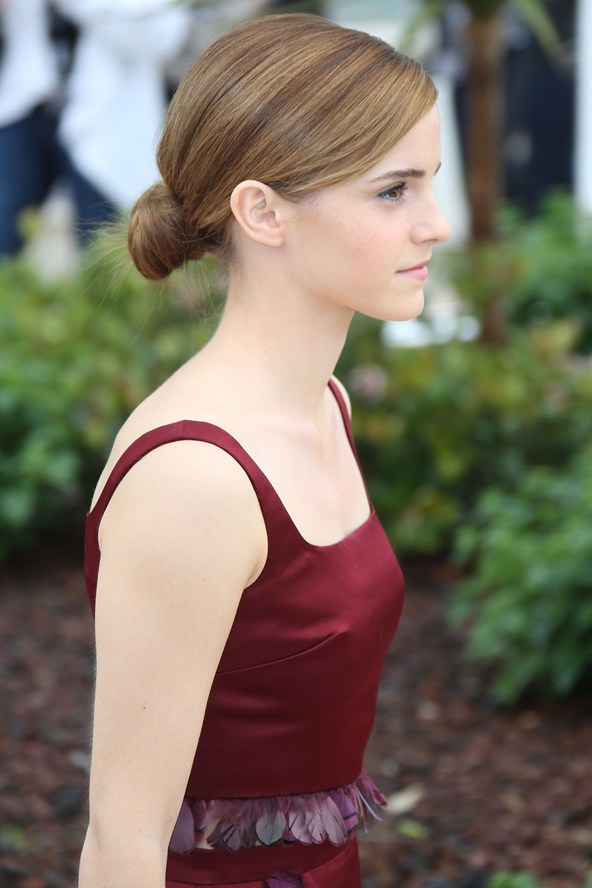 Emma-Watson-side-Vogue-16May13-PA_b_592x888